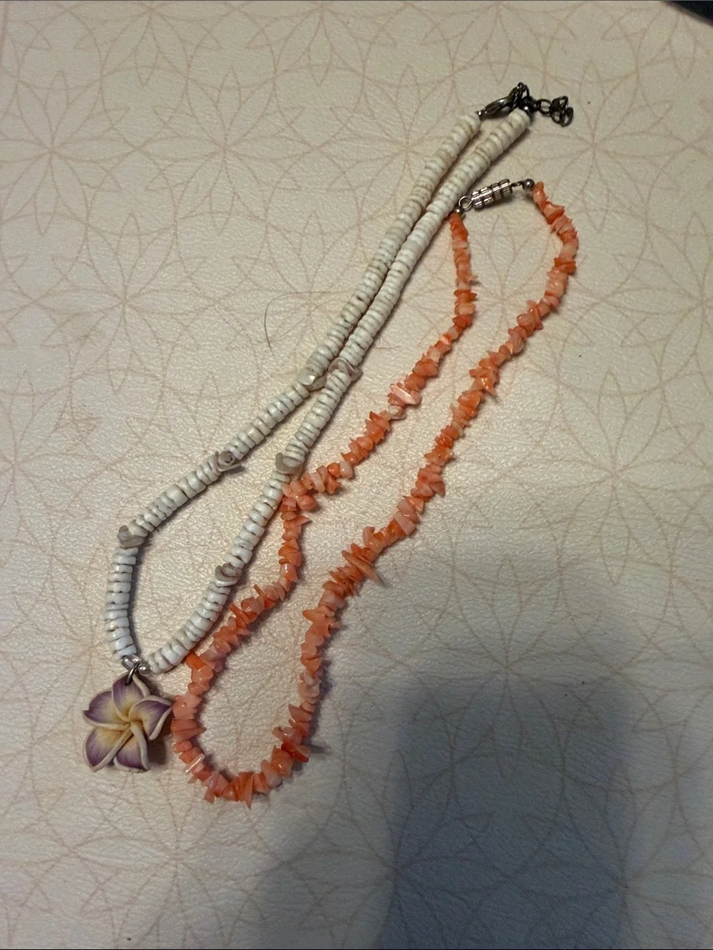 Layered White Shell and Coral Bead Necklace with Purple Flower Charm